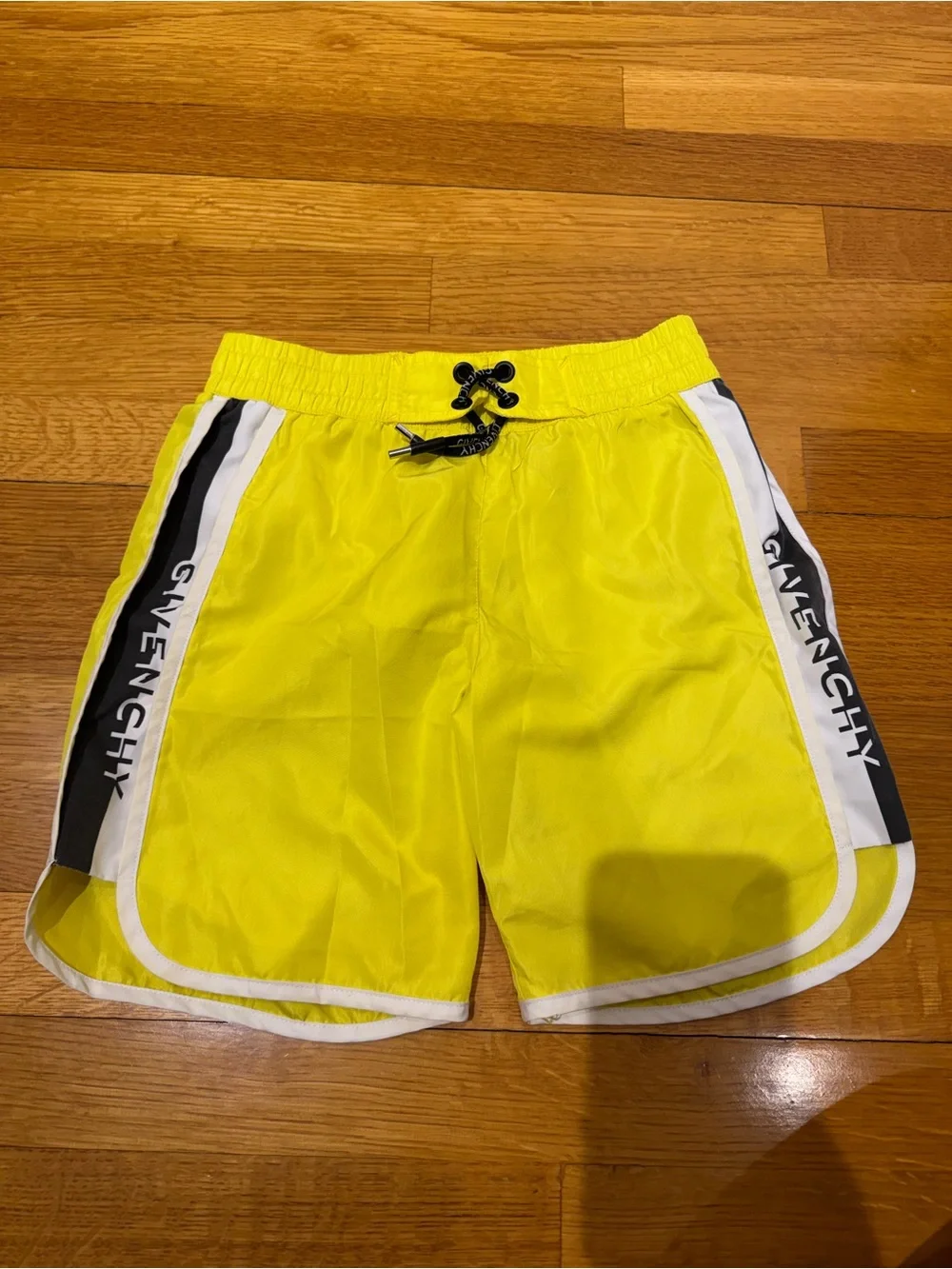 4 pairs of swim shorts Kids Graphic and Solid swim Shorts Pack - size 12
